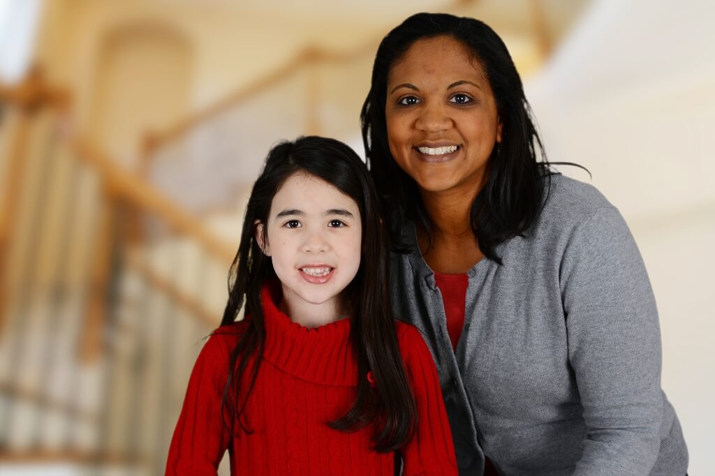 Daughter Smiling With Her Mom